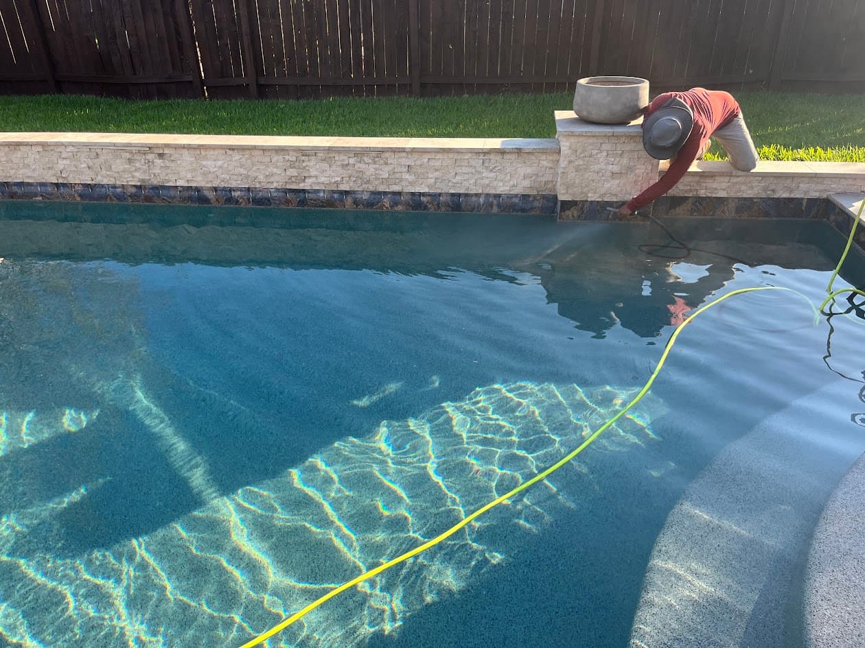 Blue Pool Tile Renovation, Sand Blasting Process, Katy TX, CHR Builder Sandblasting project in Katy, TX