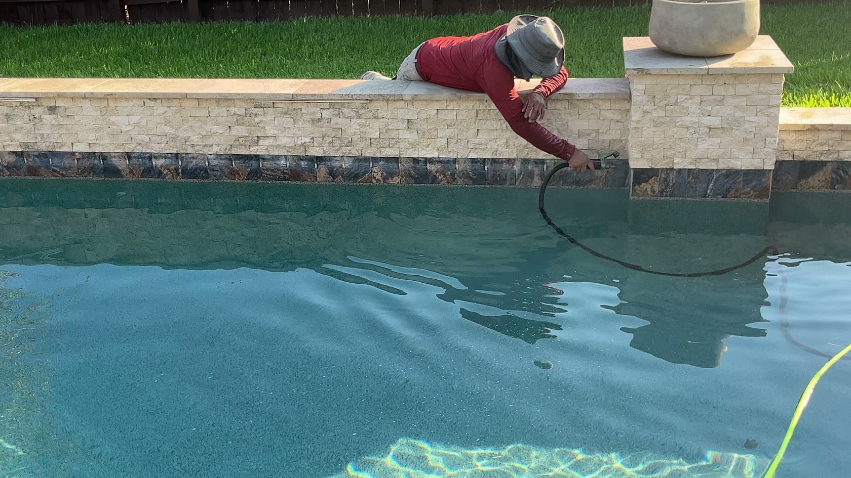 Blue Pool Tile Renovation, Sand Blasting Process, Katy TX, CHR Builder Sandblasting project in Katy, TX