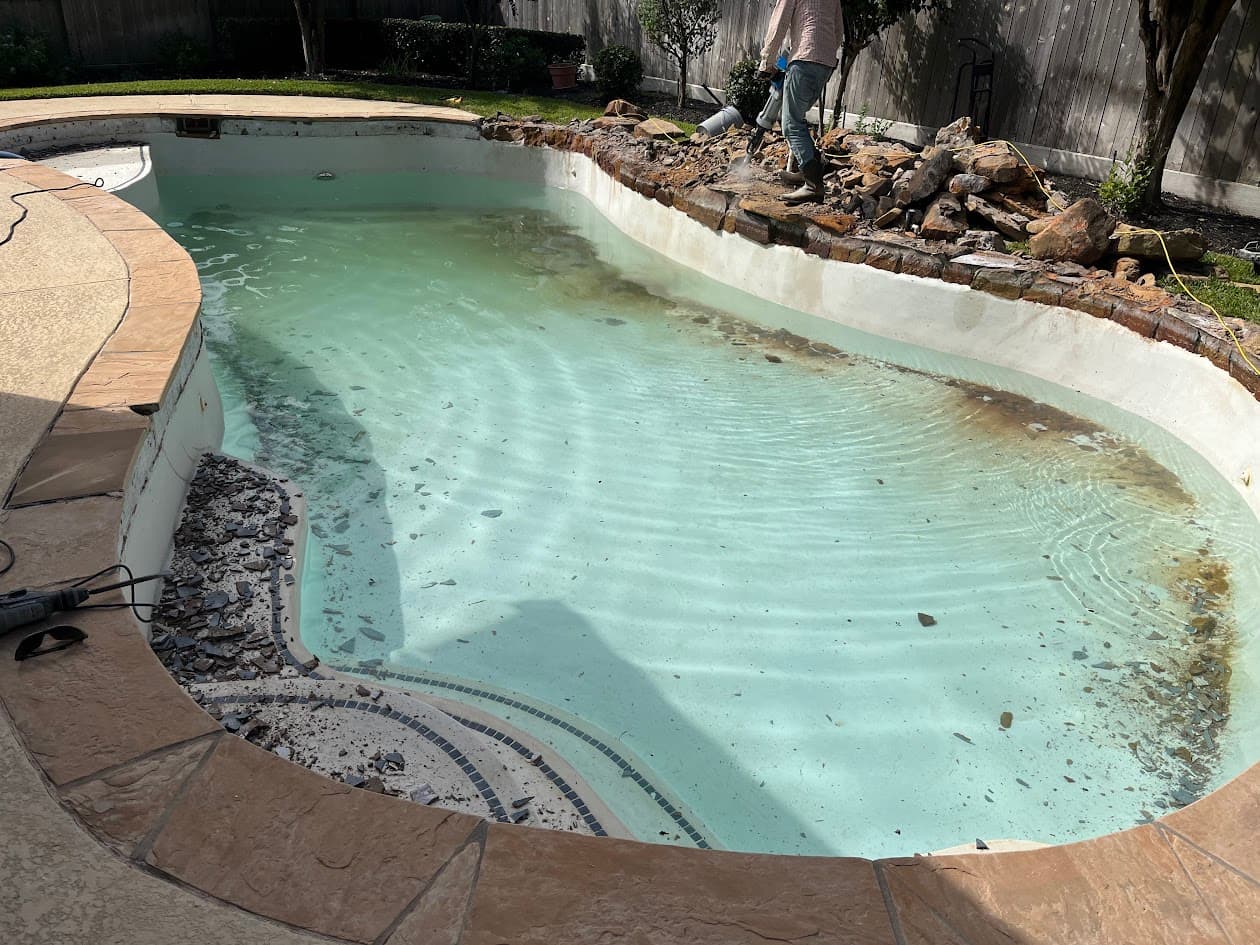 Replaster New Tile Coping Waterfall and Spray Deck, CHR Builder Renovation project in Katy/Houston area, TX
