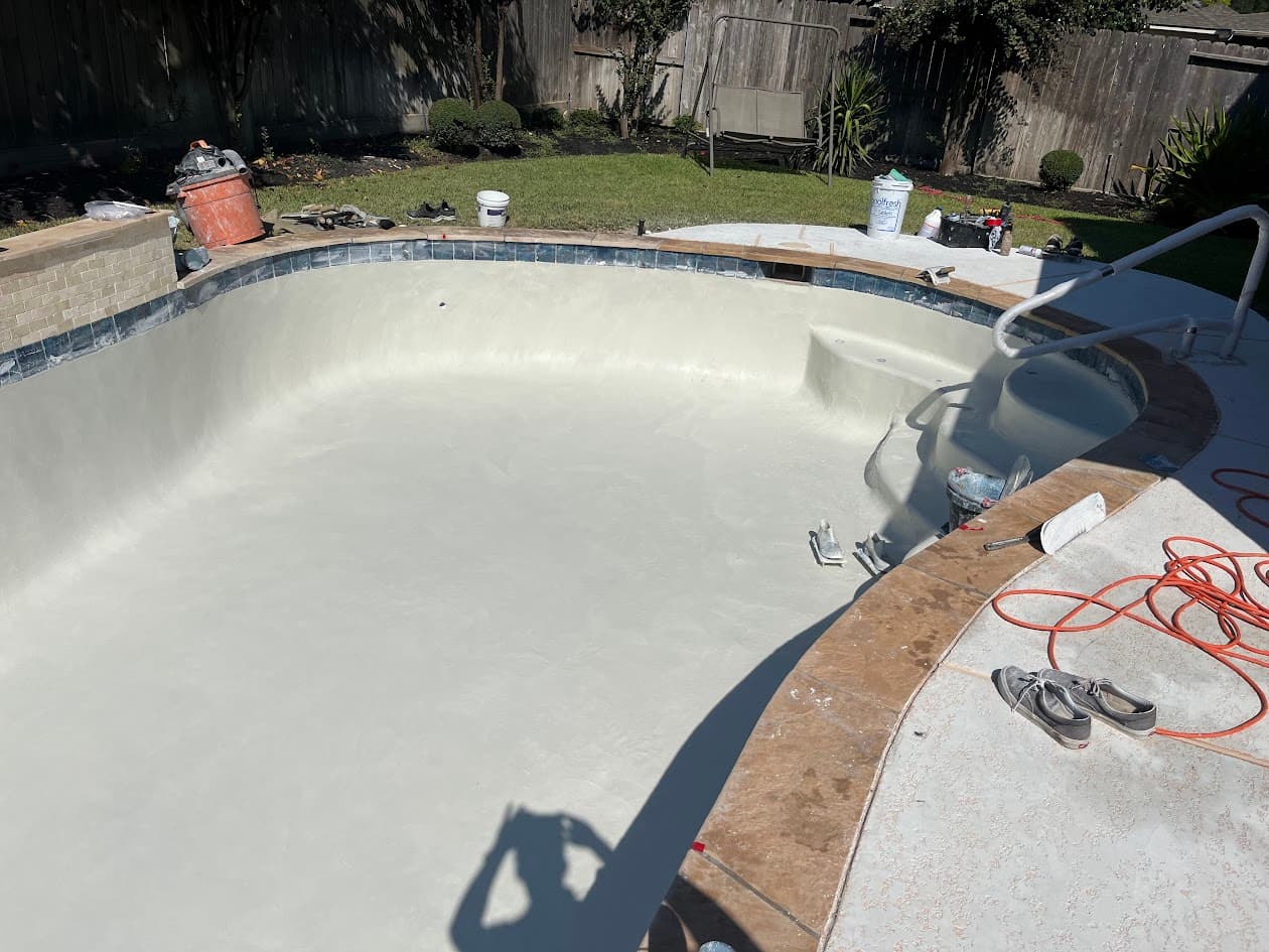 Replaster New Tile Coping Waterfall and Spray Deck, CHR Builder Renovation project in Katy/Houston area, TX