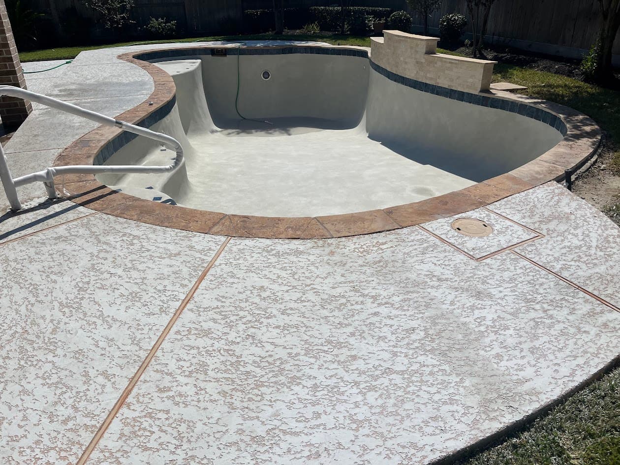 Replaster New Tile Coping Waterfall and Spray Deck, CHR Builder Renovation project in Katy/Houston area, TX