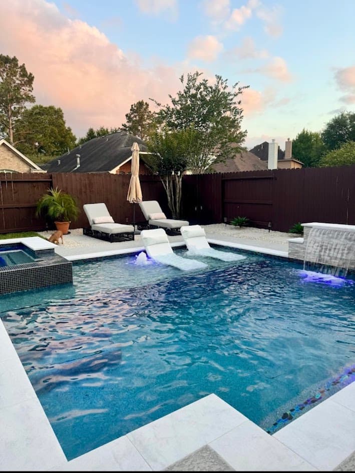 Custom pool and spa build with stonescape travertine deck, Katy TX