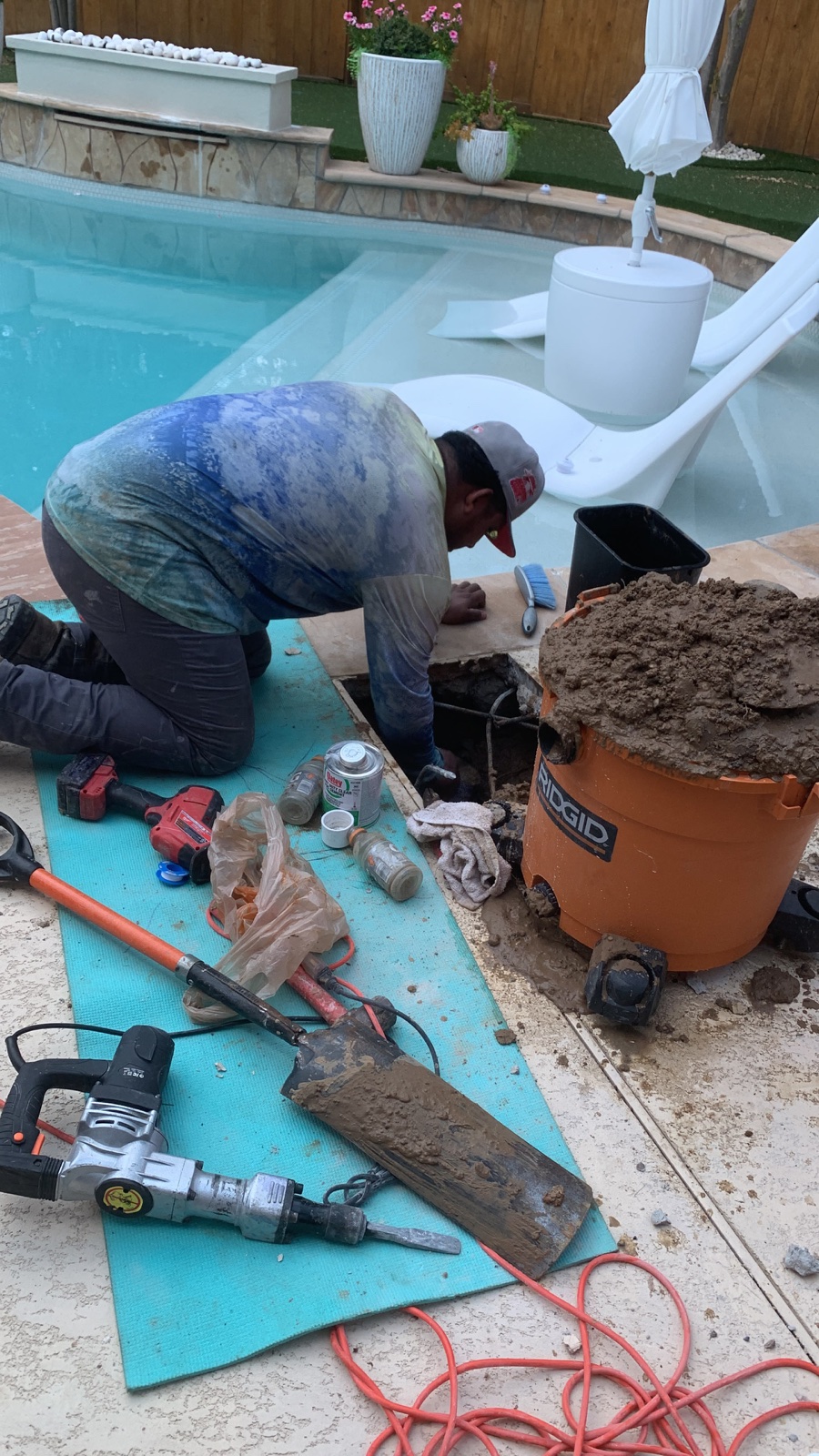 CHR Builder technician performing electronic pool leak detection in Katy TX