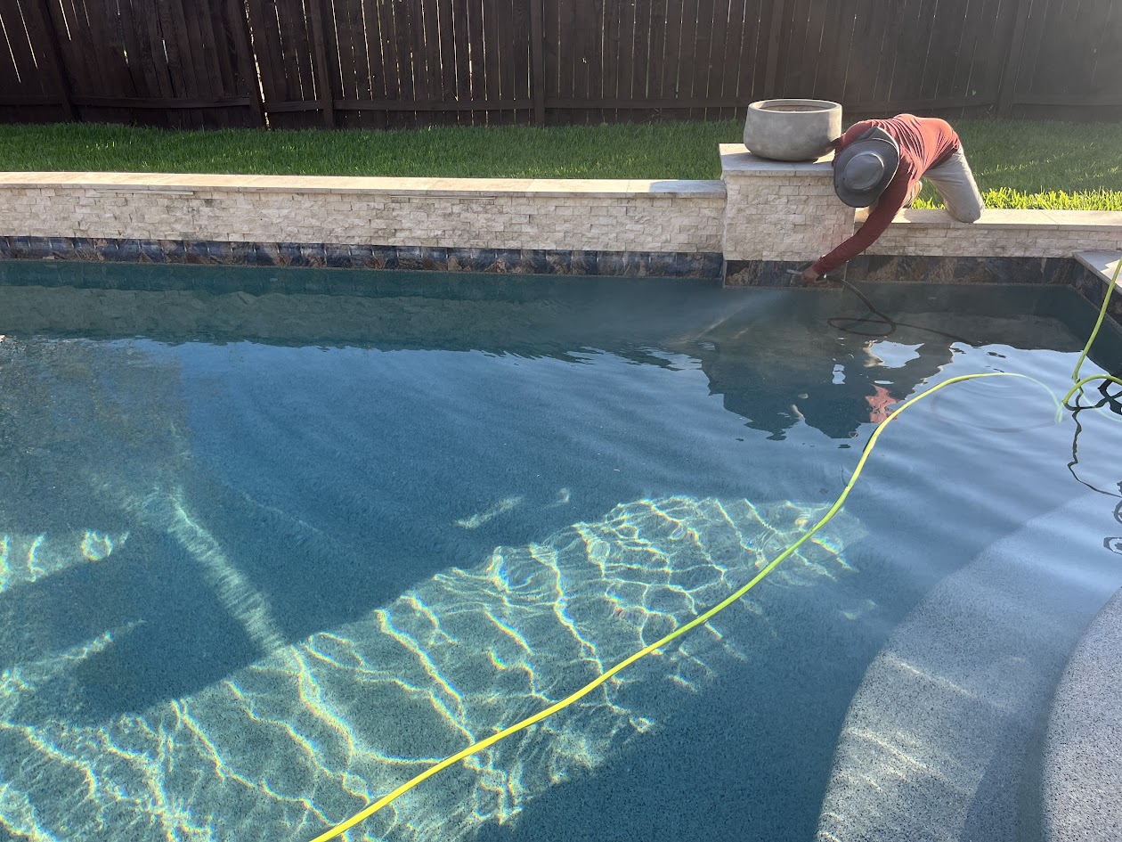 Blue Pool Tile Renovation, Sand Blasting Process, Katy TX, CHR Builder Sandblasting project in Katy, TX