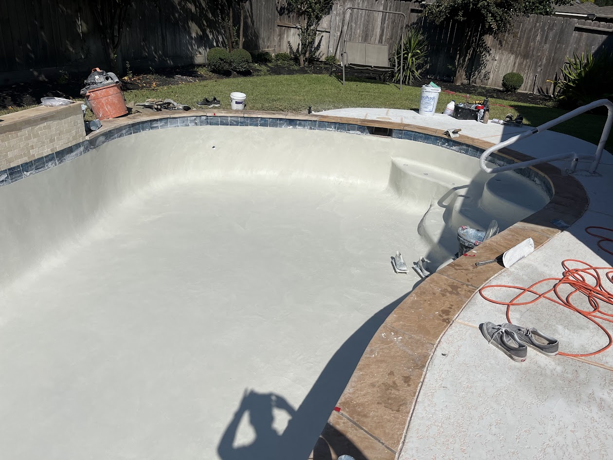 Replaster New Tile Coping Waterfall and Spray Deck, CHR Builder Renovation project in Katy/Houston area, TX